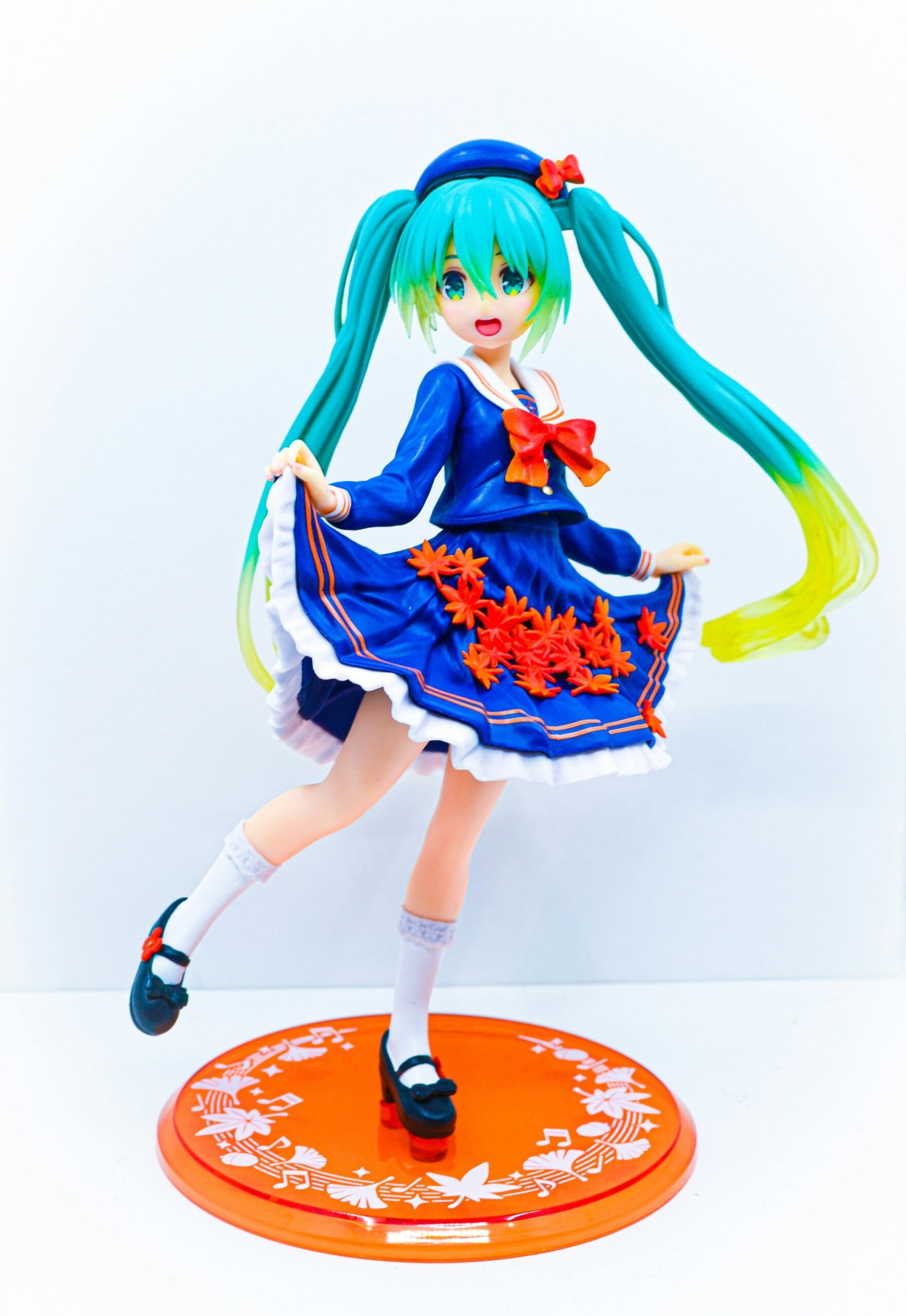 Anime figure of a girl wearing a blue dress with blue and yellow hair – kawaii toy collectible.
